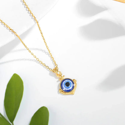 Himmelskt öga guld halsband med onda ögat